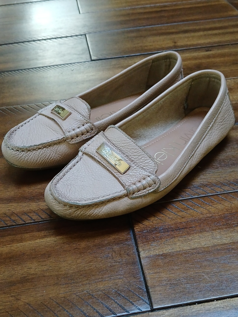 Calvin Klein Nude/Tan Leather Slip-On Loafers with Gold Plaque